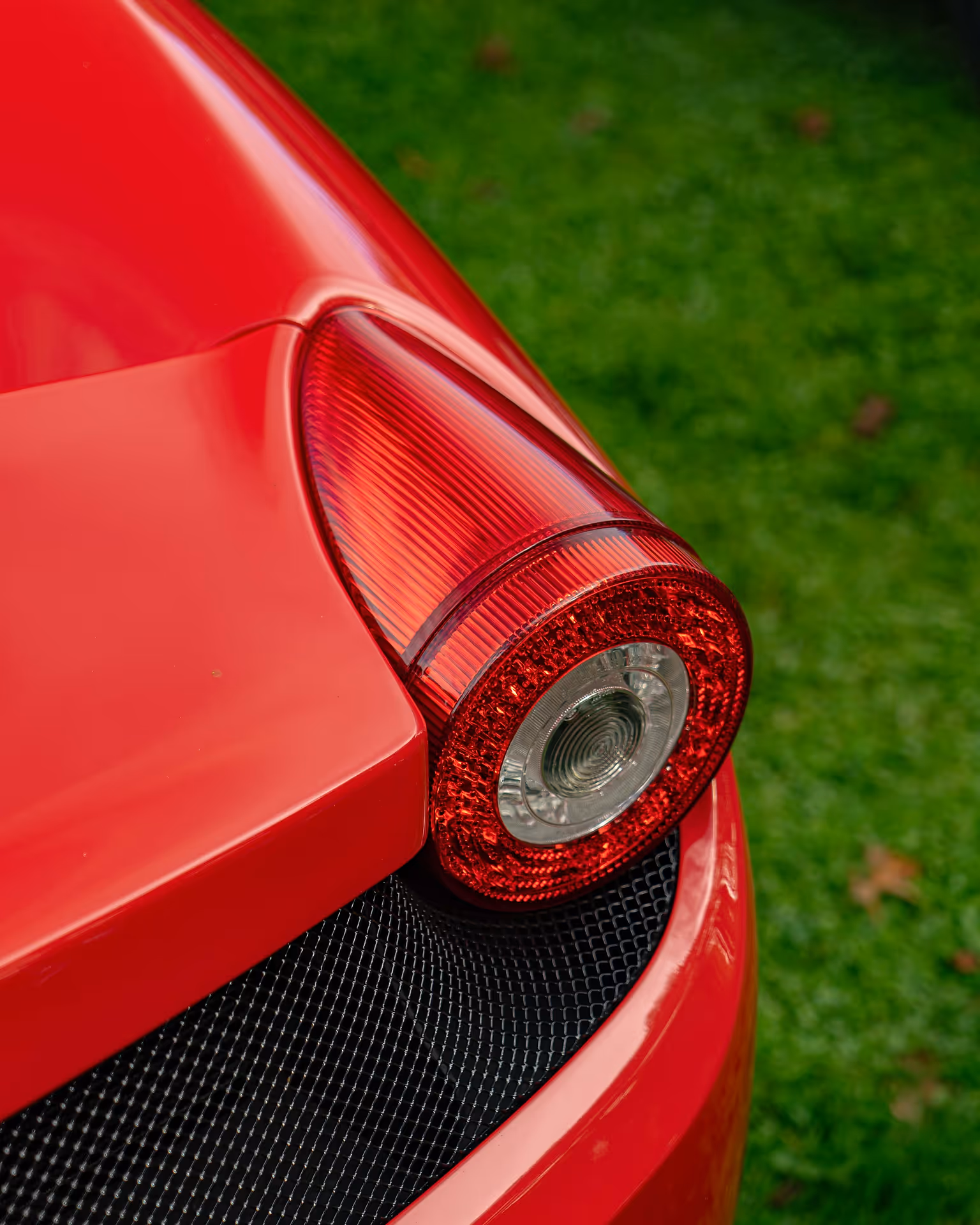 Rear light on a bright red car